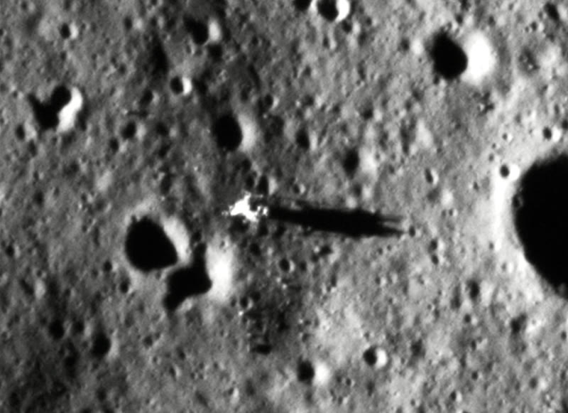 Apollo 11, Chandrayaan-2 OHRC. The descent stage is the bright knot. The shadow runs off to the right.